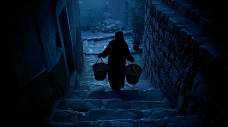 Woman carrying baskets in the AI film, called Midnight Drop.