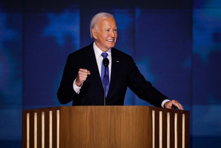 a man in a suit smiles