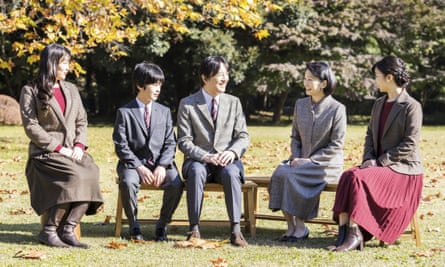 Crown Prince Fumihito, centre, talks with his wife Crown Princess Kiko, second right, and their children, Princess Mako, left, Prince Hisahito, second left, and Princess Kako, far right.