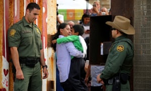 The border fence gate between US and Mexico is opened for a few hours to allow separated families to embrace as part of Universal Children’s Day on 19 November 2016.