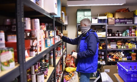 A volunteer working at a food bank in Newcastle-Under-Lyme. 