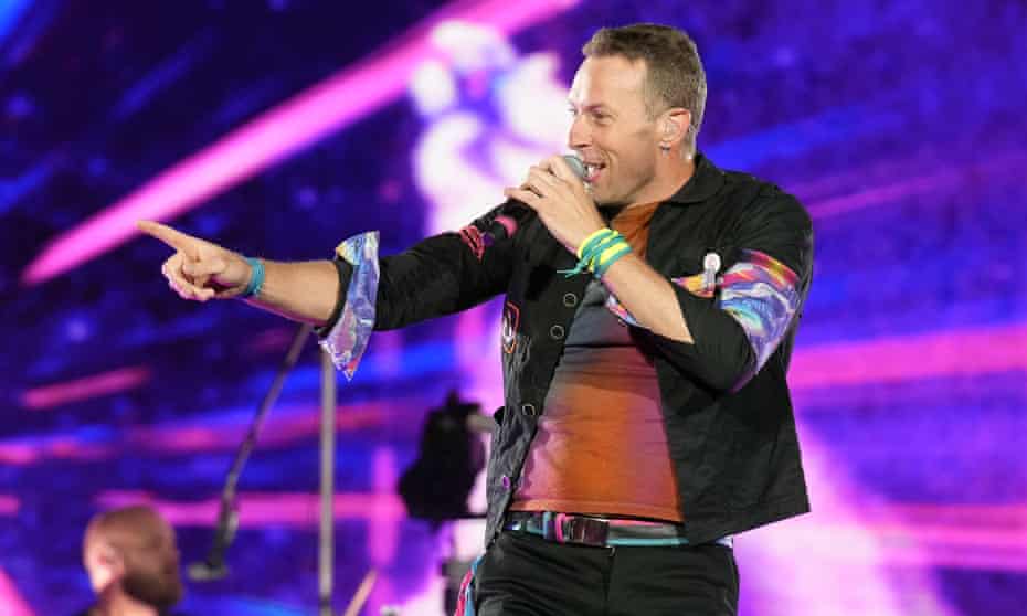 Coldplay’s Chris Martin performs during the band's Music of the Spheres world tour in Glendale, Arizona. 