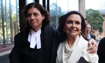 Sue Chrysanthou SC hugs Lisa Wilkinson as they emerge from court after successfully defending defamation case brought by Bruce Lehrmann