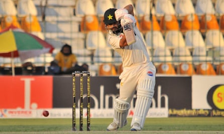 Kamran Ghulam drives during his patient, judicious century on day one.