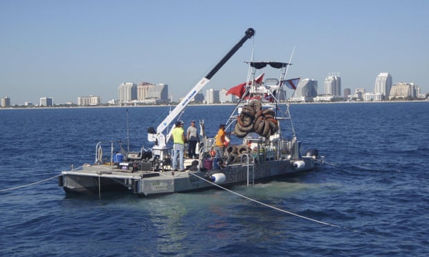A salvage crew hauls up tires from Osborne Tire Reef off the coast of Fort Lauderdale, Florida, earlier this month.