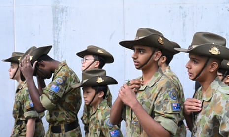 Army cadets prepare ahead of the march.