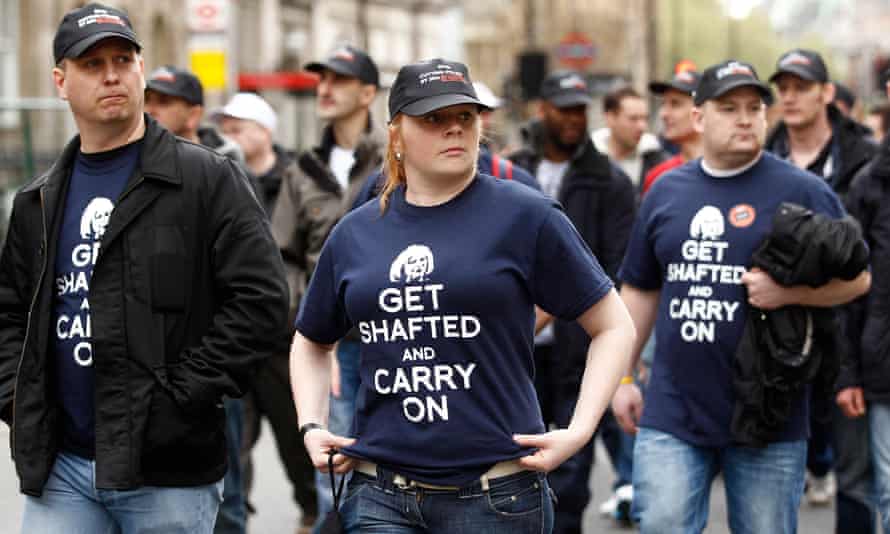 Off-duty police officers march in protest at funding cuts, May 2012.