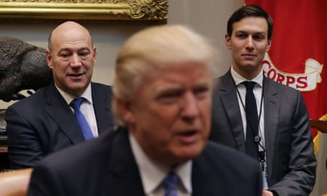 Gary Cohn, left, and Jared Kushner listen to Donald Trump address business leaders in January.