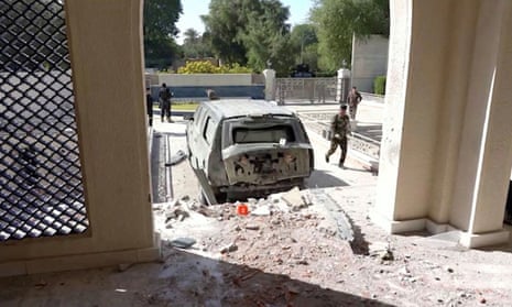 The remains of vehicle parked in front of Mustafa al-Kadhimi's residence in Baghdad’s green zone after the drone attack.