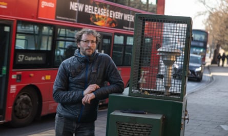 Oliver Lord, Head of Clean Cities Campaign Strategy, next to Kingston upon Thames Air Quality Monitor.