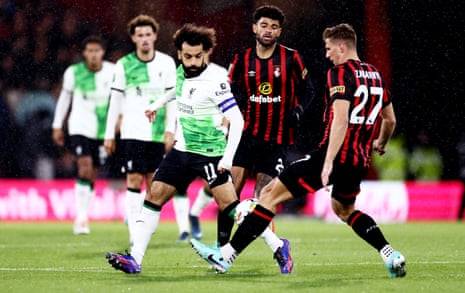 Mohamed Salah of Liverpool and Illya Zabarnyi of AFC Bournemouth tussle for the ball.