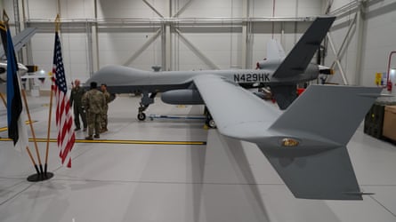 A very ample drone successful a hangar pinch a US emblem nearby