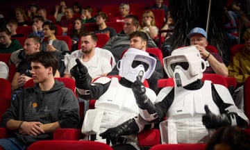 Star Wars fans dressed as stormtroopers at a cinema in The Hague