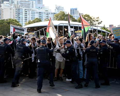 Protesters and NSW police clash during an attempted blockade by the Palestine Action Group at the weapons expo at the ICC Sydney