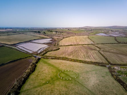 Aerial view of a stone circle in fields in countryside