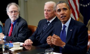 Bob Bauer and then Vice-President Joe Biden listen as President Barack Obama speaks during a meeting on elections law, in 2014.