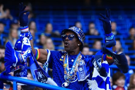 A Chelsea fan shows his support.