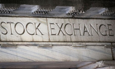 "Stock Exchange" is seen over an entrance to the New York Stock Exchange.