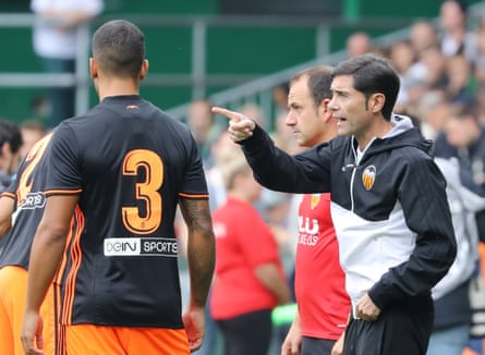 Valencia’s coach Marcelino Garcia instructs Ruben Vezo during a pre-season friendly against Werder Bremen