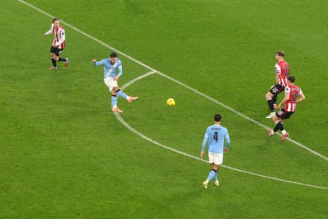 Rayan Cherki fires home from outside the penalty area to give Manchester City the lead.
