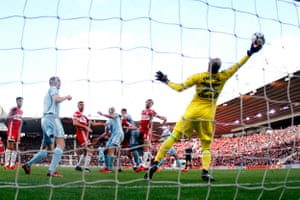 Middlesbrough goalkeeper Darren Randolph saves a header from Tyias Browning of Sunderland to keep the score at 2-0 as they beat fellow north-east side Sunderland