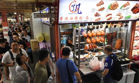 Customers queue at the Michelin-starred Hong Kong Soya Sauce Chicken Rice and Noodle stall.