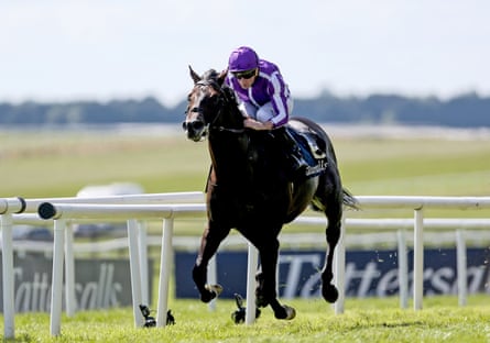 Gstaad, ridden by Ryan Moore, on their way to winning the Irish Guineas at The Curragh in May