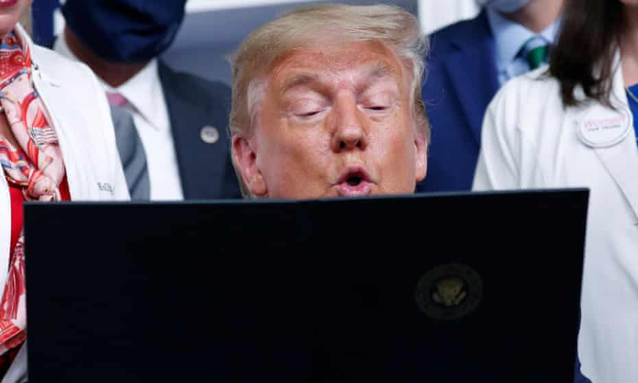 Donald Trump at a laptop