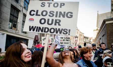 Sex workers protest against the closure of window brothels in Amsterdam.