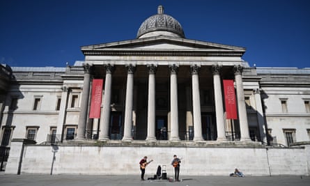Buskers play to no audience outside the National Gallery in London, Britain on 16 March 2020