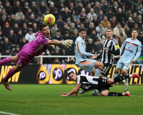 Brentford's Vitaly Janelt scores their equaliser past Newcastle's keeper Nick Pope.