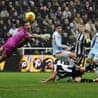 Brentford's Vitaly Janelt scores their equaliser past Newcastle's keeper Nick Pope.