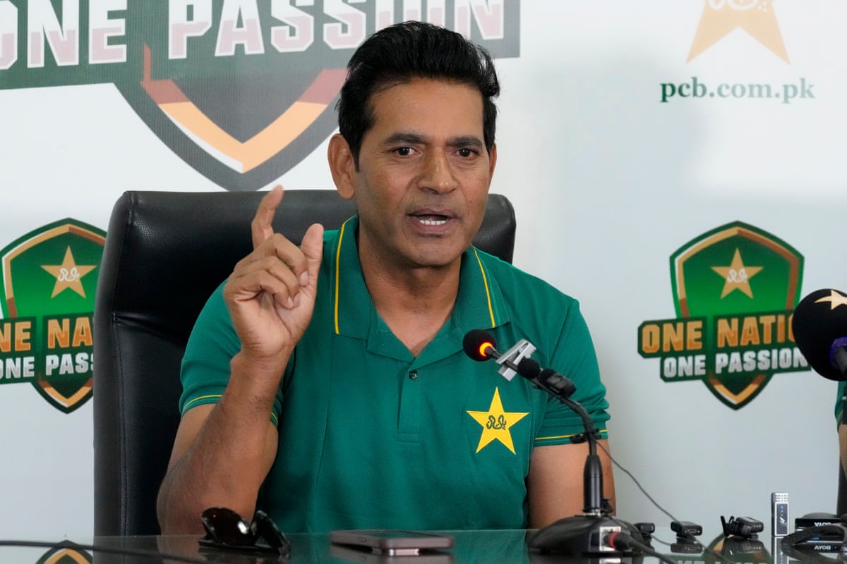 Aaqib Javed speaks during a press conference