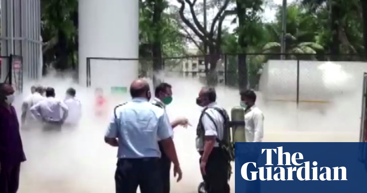 India: officials scramble to stop oxygen tank leak that left 22 Covid-19 patients dead – video