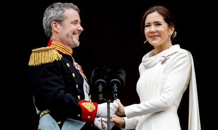 King Frederik and Queen Mary hold hands