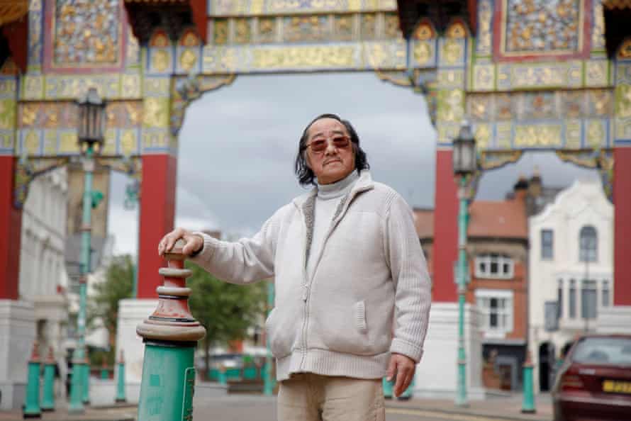 Peter Foo at Chinatown Gate on Nelson Street, Liverpool.