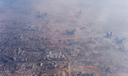 Smog enveloping buildings on the outskirts of Delhi