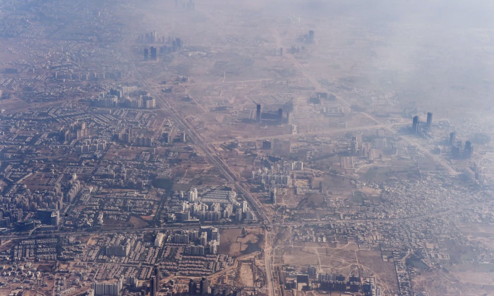 Smog envelops buildings on the outskirts of New Delhi. 
