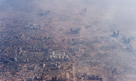 Smog envelops buildings on the outskirts of New Delhi.