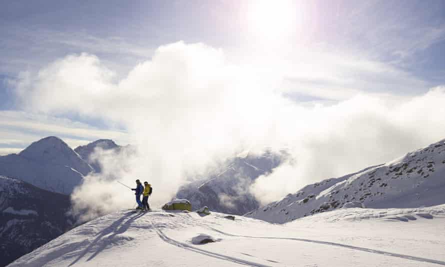 Two skiers off piste in Switzerland