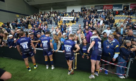 Worcester players talk with the club’s supporters after the Premiership match against Exeter.