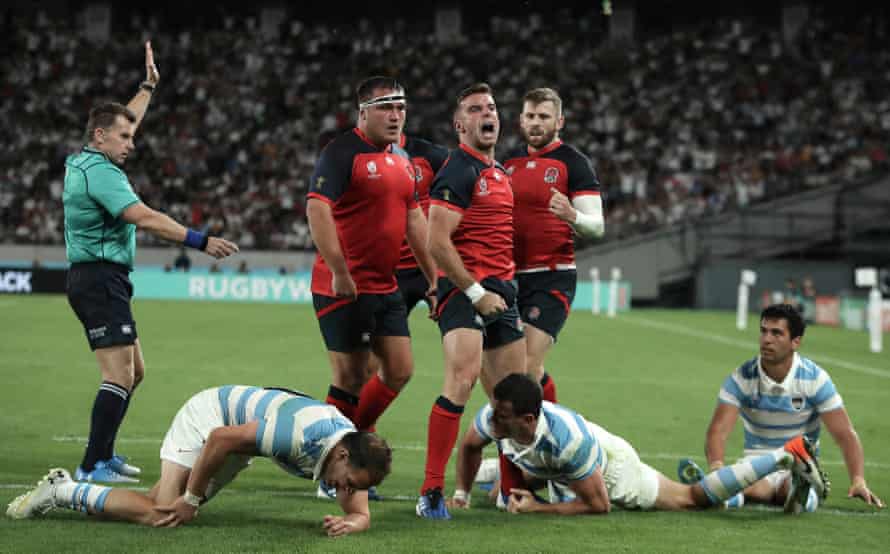 England’s fly-half George Ford celebrates after scoring a try against Argentina at Tokyo Stadium.