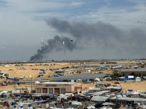 Smoke rises during an Israeli ground operation in Khan Younis, seen from a tent camp sheltering displaced Palestinians in Rafah