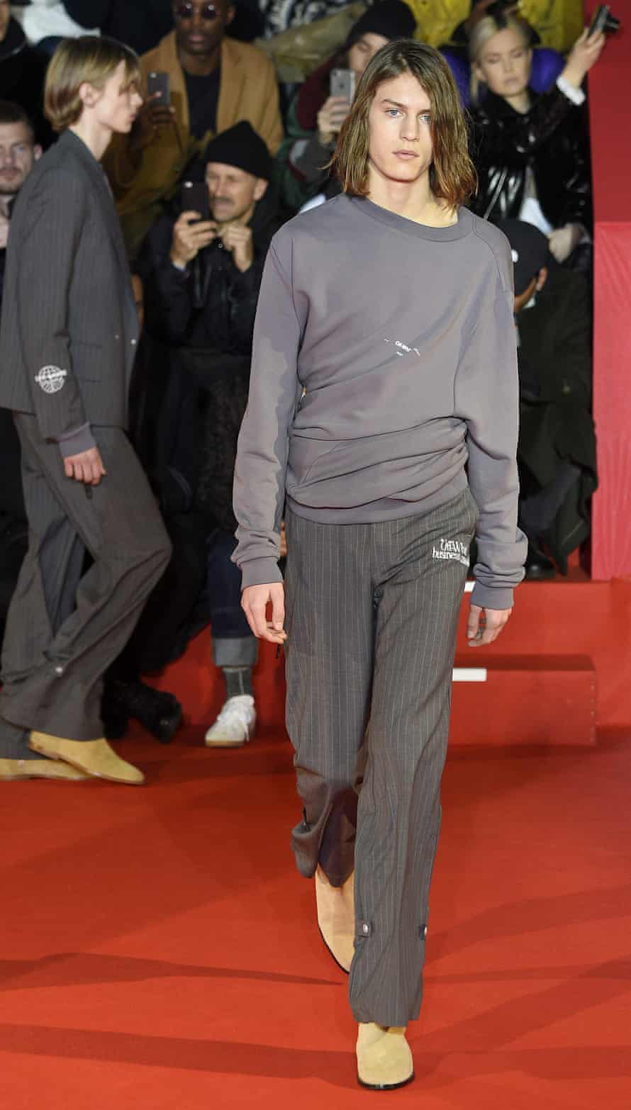 Pinstripe trousers at Off/White's 'Business Casual' presentation, Paris.