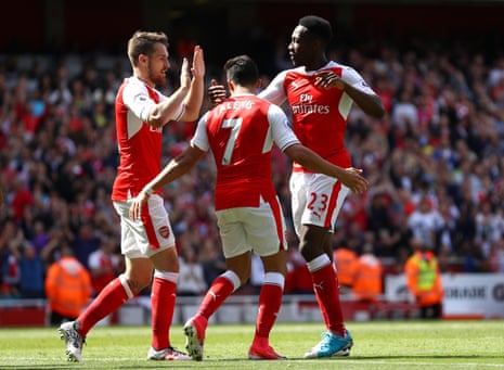 Ramsey and Welbeck help Sanchez celebrate Arsenal’s second.