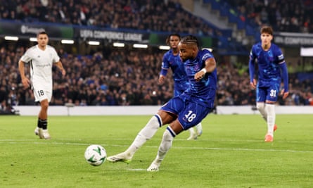 Christopher Nkunku scores his second and Chelsea’s eighth goal from the penalty spot.