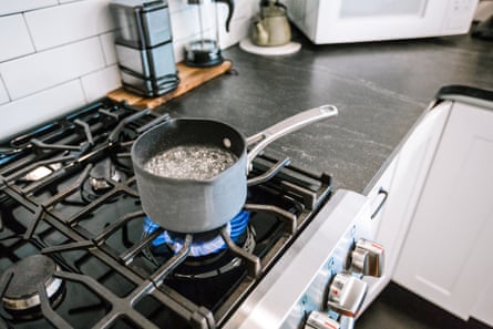 Gas stove kitchen with water boiling