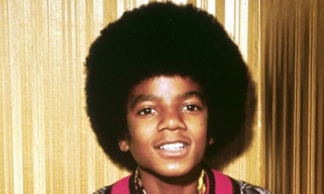 The young Michael Jackson with an afro hairstyle