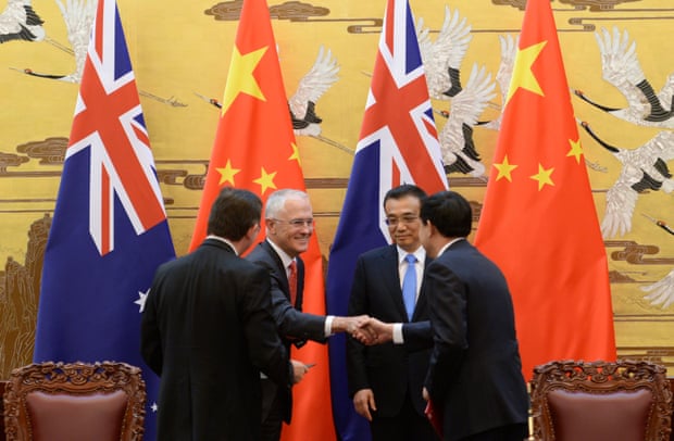 Chinese premier Li Keqiang (centre right) attends a signing ceremony with Australian prime minister Malcolm Turnbull at the Great Hall of the People in Beijing on 14 April 2016.