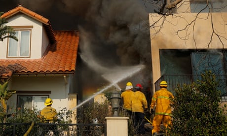 Firefighters work to control flames